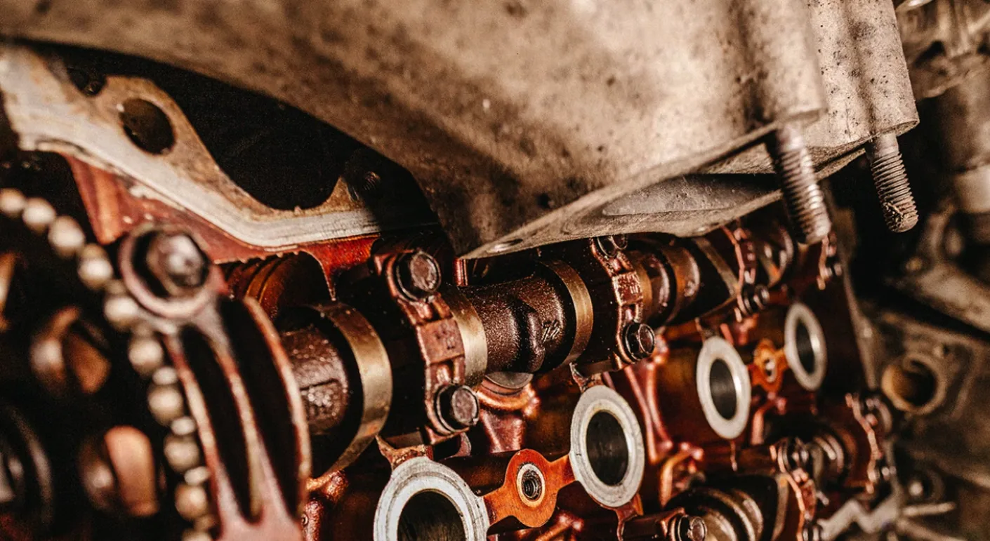 Close-up of a diesel engine camshaft and valvetrain during a rebuild